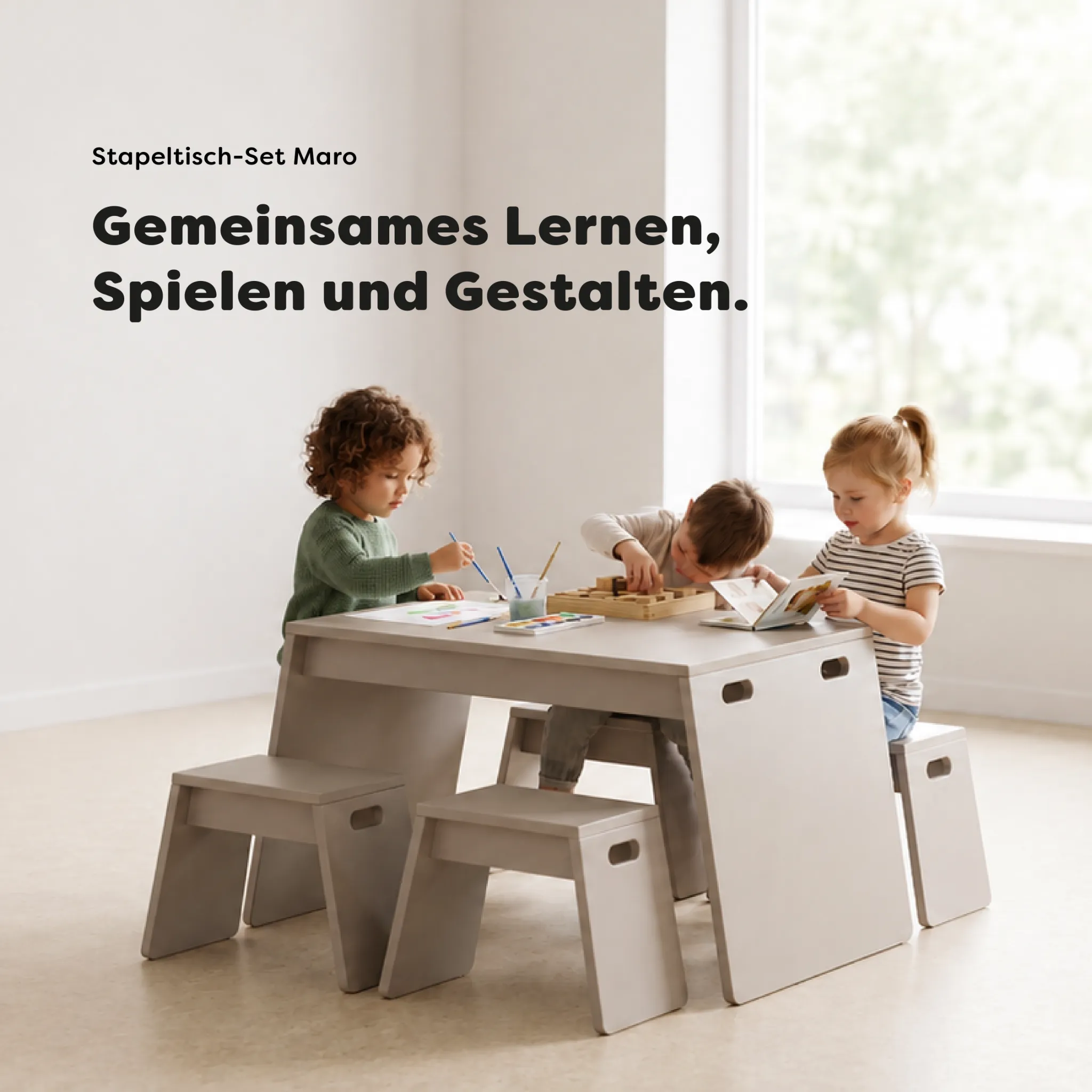 Drei Kinder spielen, malen und lesen am Stapeltisch-Set Maro mit platzsparend stapelbaren Sitzmöbeln für Kita und Schule.